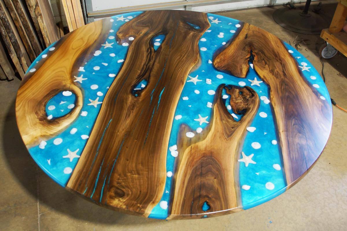 round-walnut-conference-table-with-embedded-seashells-8